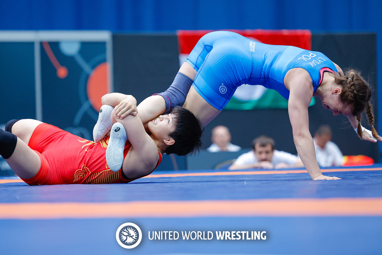 57kg WW - Kexin Hong (CHN) df. Anhelina Lysak (POL) 0159-X3.jpg